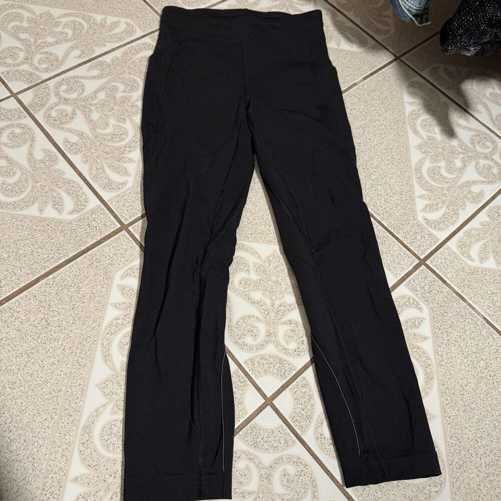 Lululemon Size 4 Reflective Pant Leggings Solid Black Side Pockets Pull On